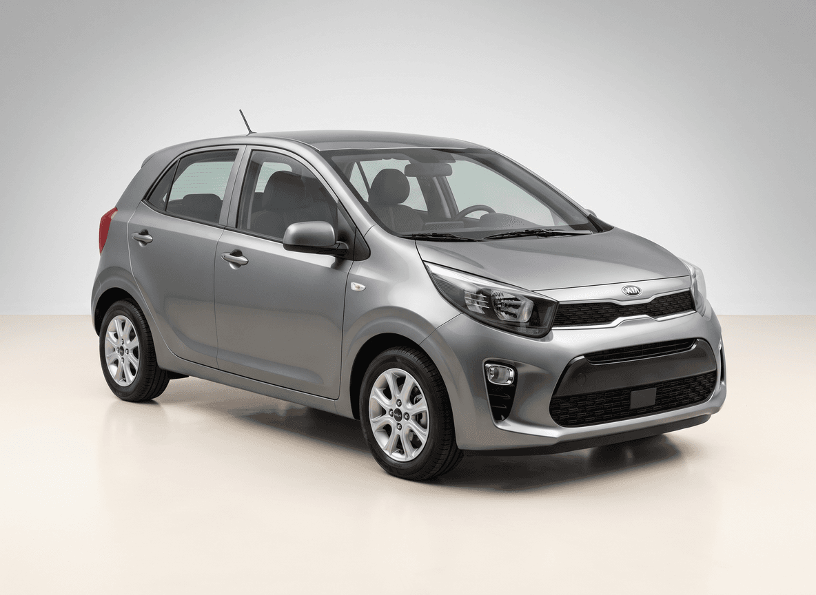 Silver Kia Picanto city car in a pale studio
